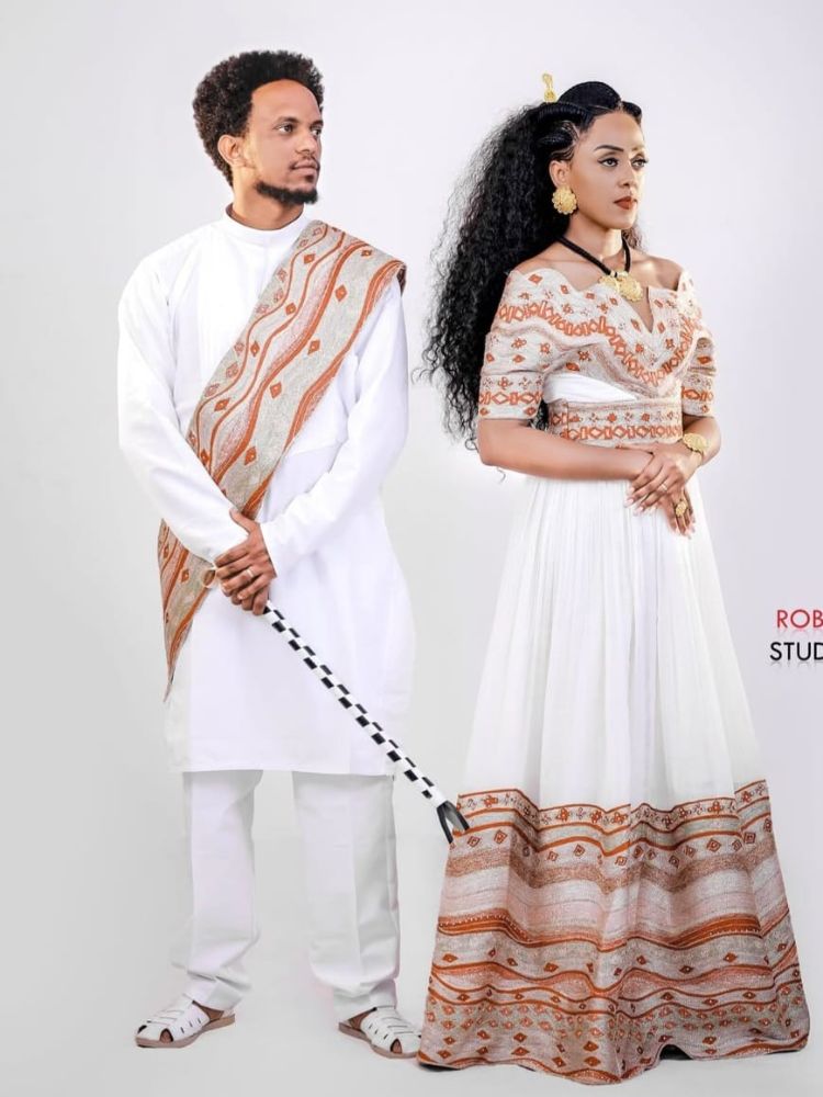 Handmade Ethiopian Couple Clothing Set: Traditional Kemis & Men's Attire 009